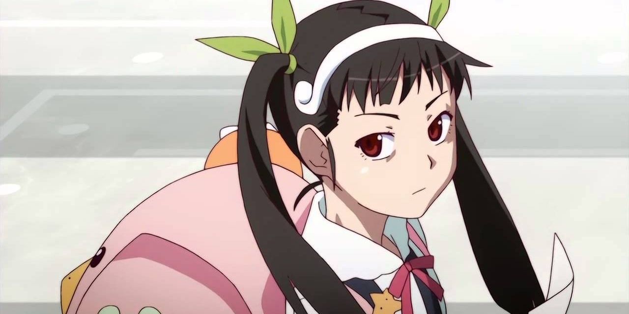 An image of Mayoi Hachikuji with a straight face while she is carrying a backpack.
