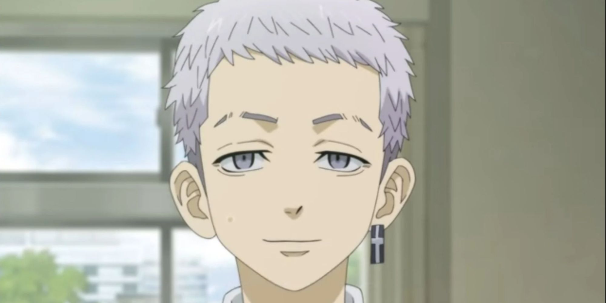 a boy with silver hair and a dangley earring