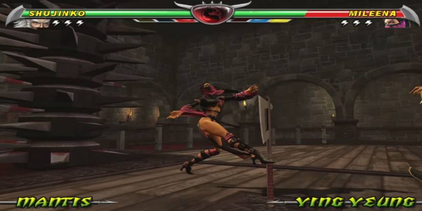 Mileena flying past a large axe and towards meat grinders