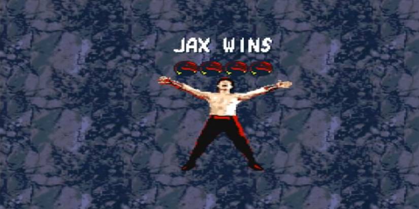 Liu Kang stretched out on the bottom of a pit, with "JAX WINS" and 4 dragon logos