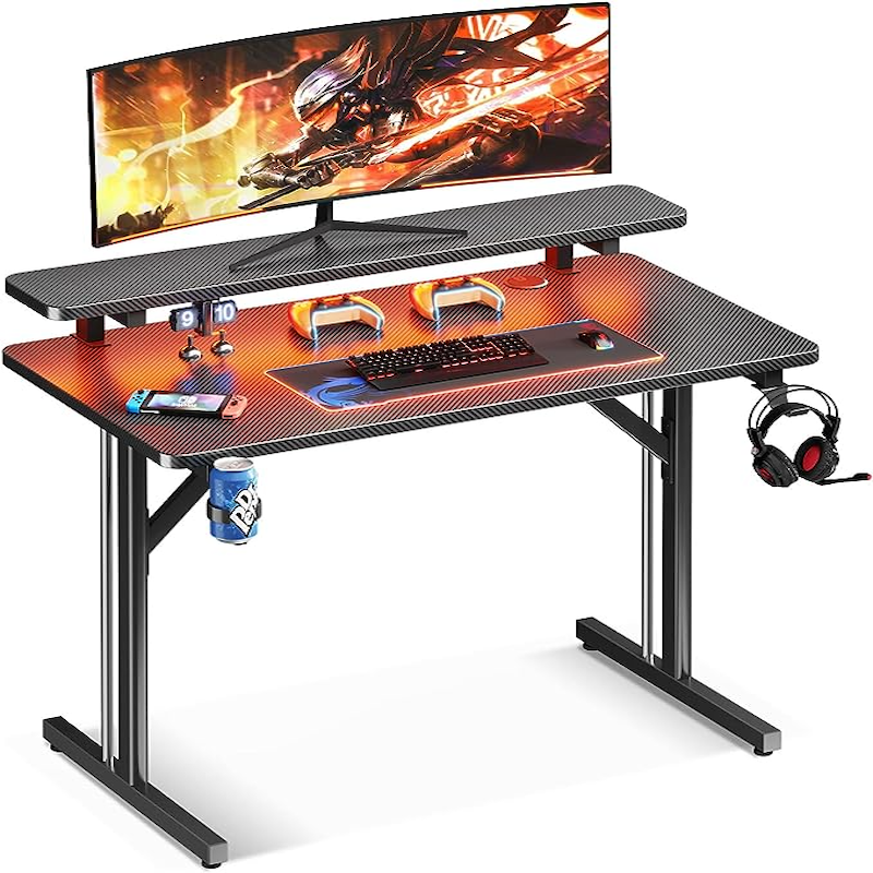 MOTPK 31-inch Small Gaming Desk with monitor, keyboards, and Nintendo Switch
