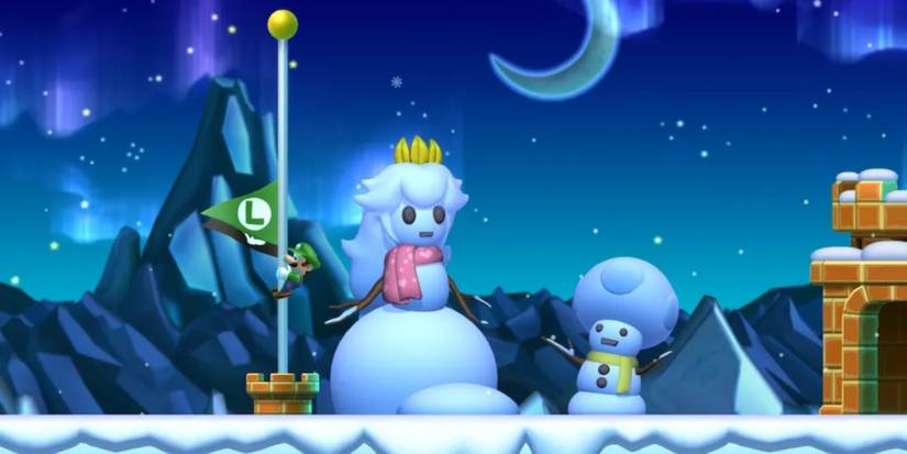 Luigi with snowmen of Peach and Toad at the flag