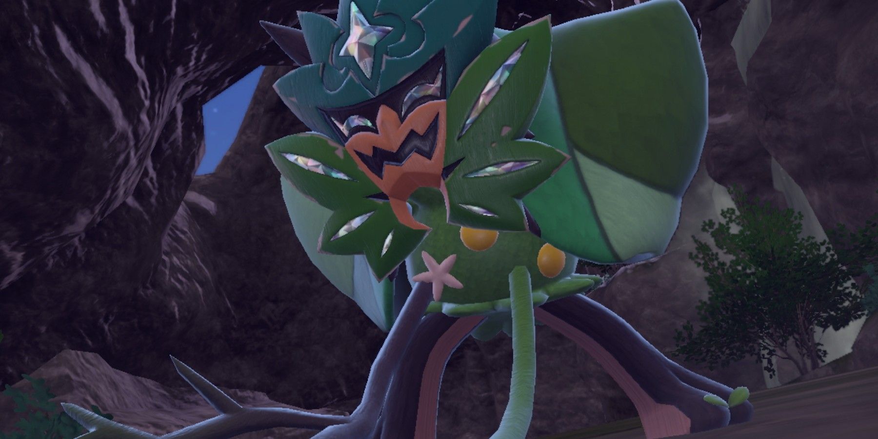 pokemon escarlata y violeta un primer plano del legendario pokemon ogerpon con la máscara verde azulado dlc