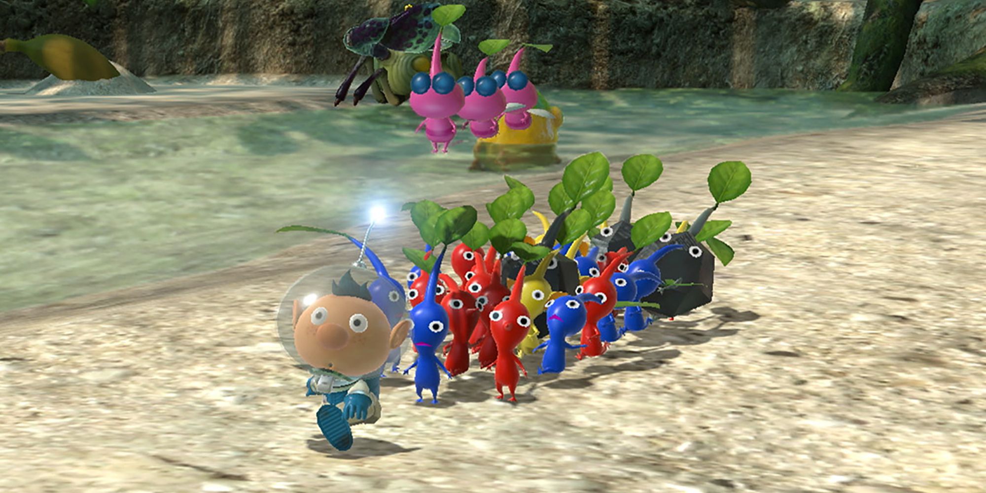 Alph leading a group of Pikmin near water