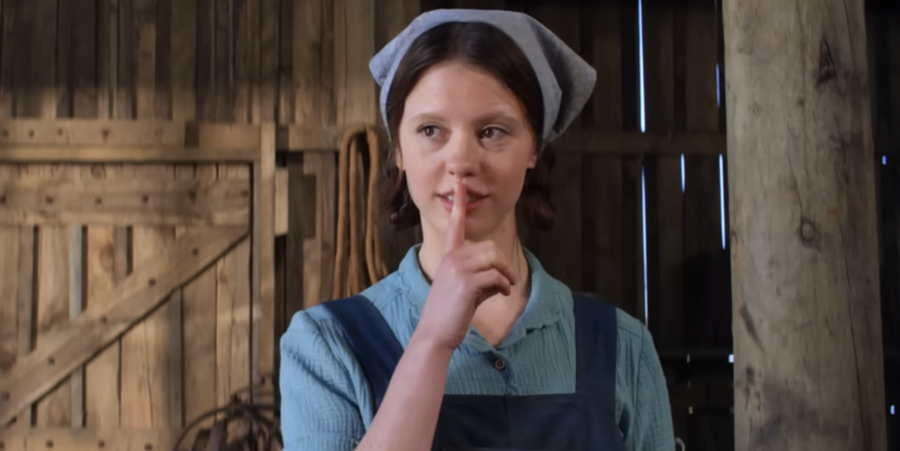 Pearl shushing with finger to lips