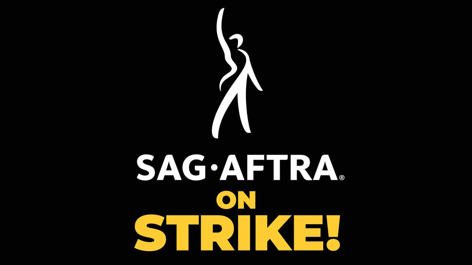 An image of the white and yellow SAG-AFTRA strike logo against a black background.