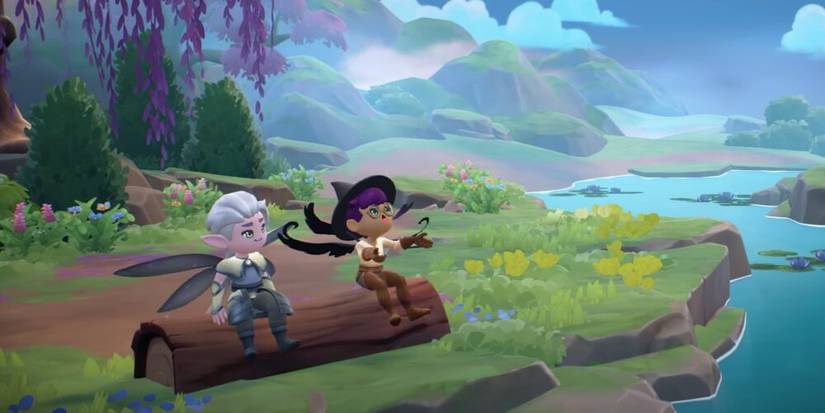 The Player And Nhamashal Relaxing On A Log