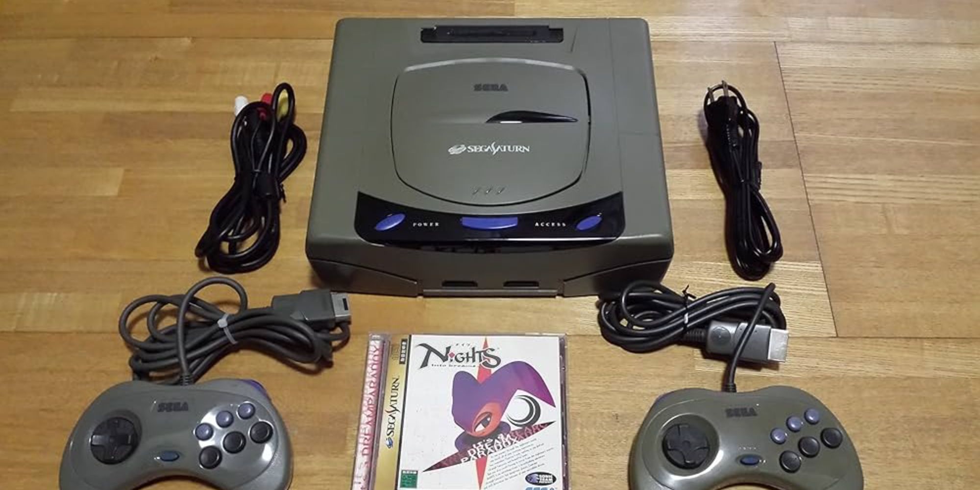 A Sega Saturn with controllers and Nights into Dreams