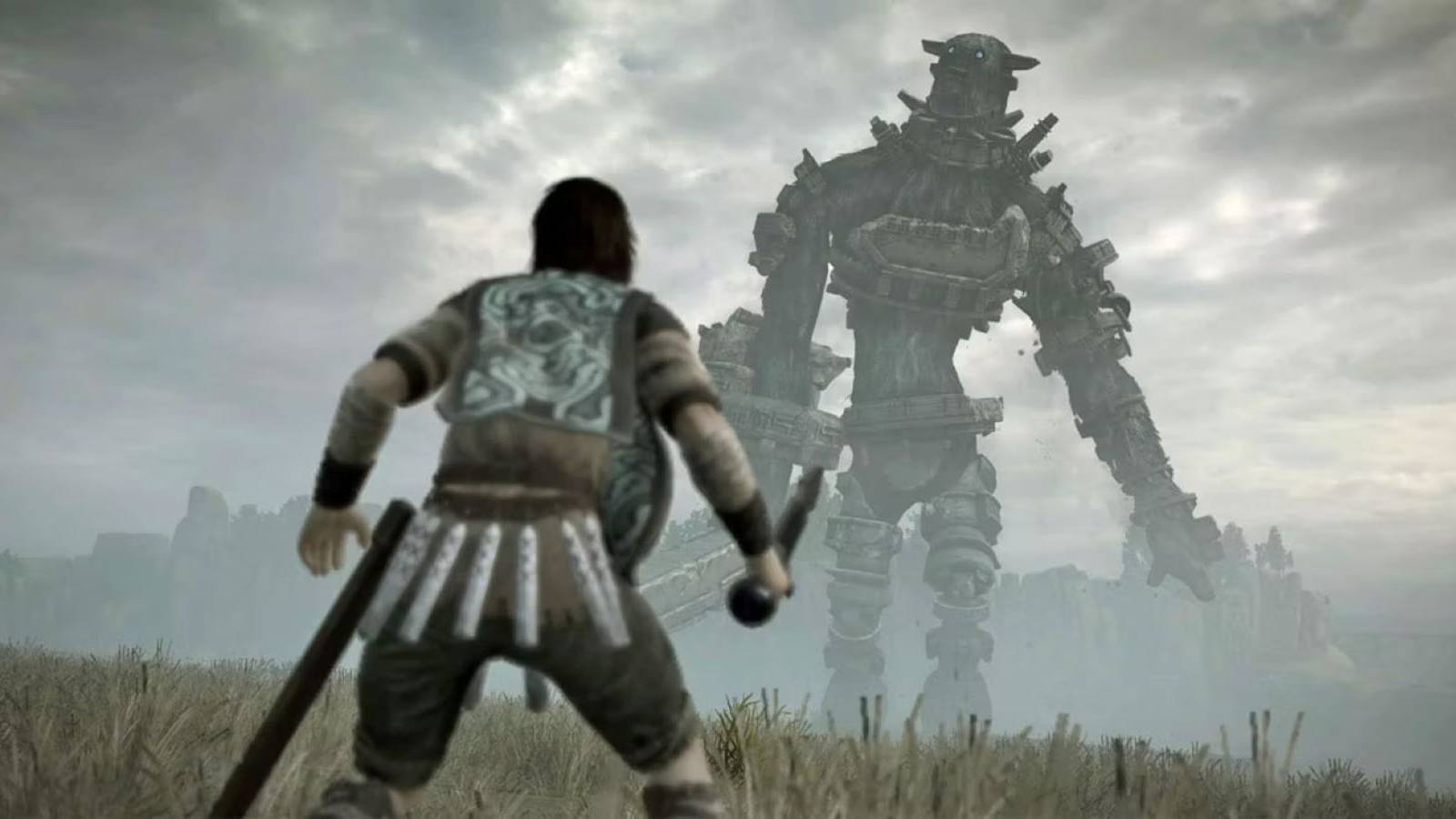 Wander confronting one of the colossi in Shadow of the Colossus