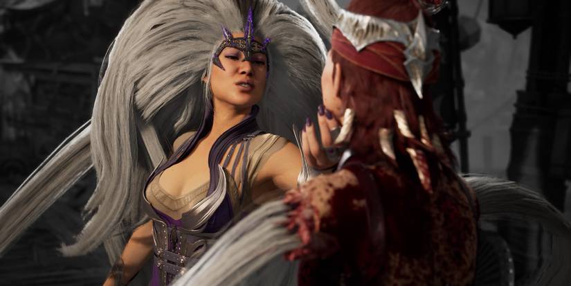 Sindel holding up Nitara Mortal Kombat 1