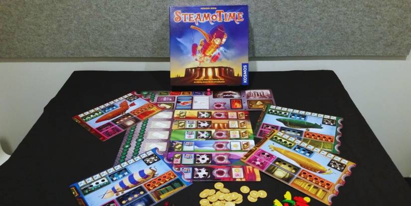 Steam Time board game unboxed, showcasing airships, crystals, and historical landmarks on the board.