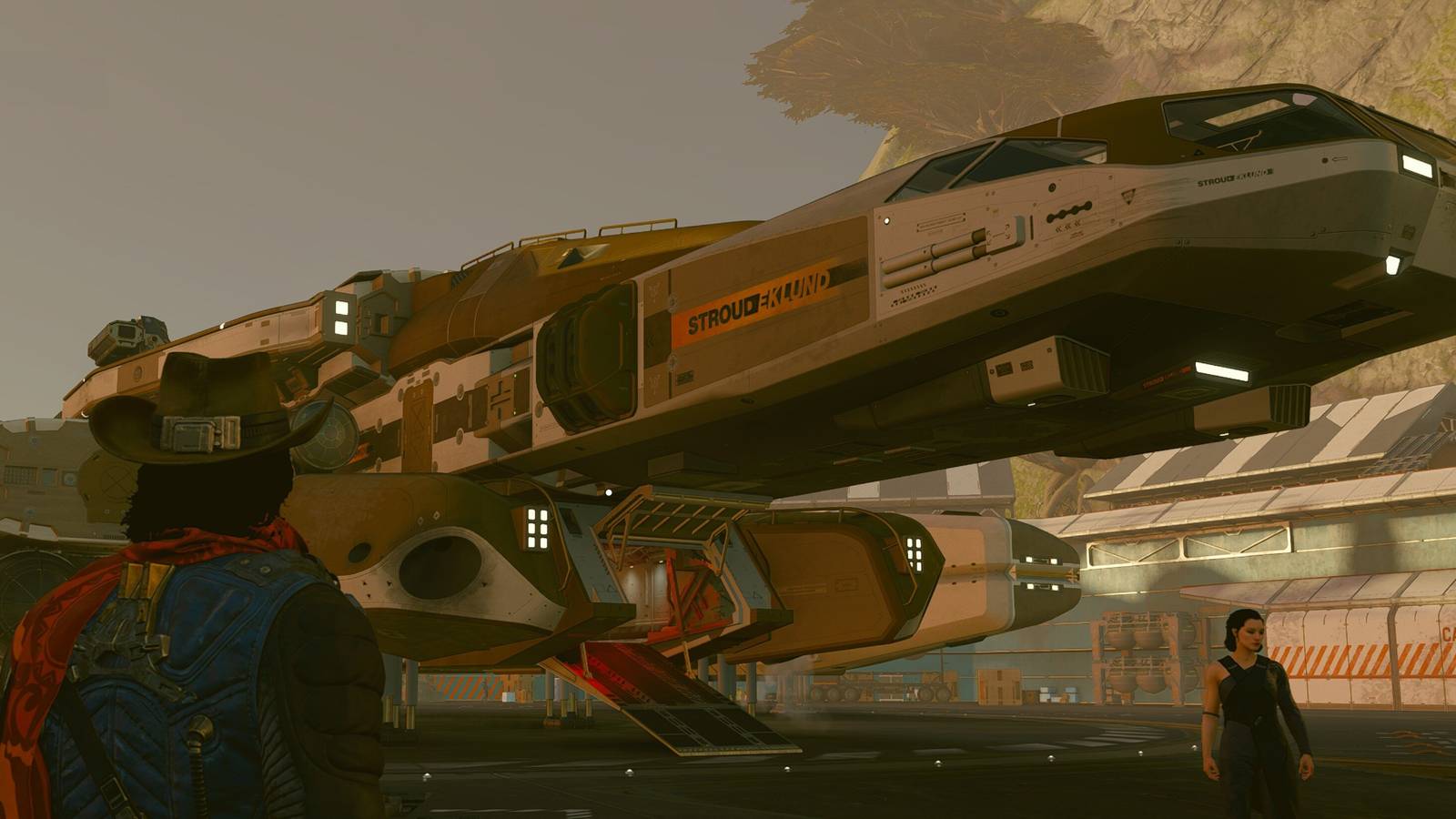 starfield player in delgado's outfit looking at their star eagle ship with andreja