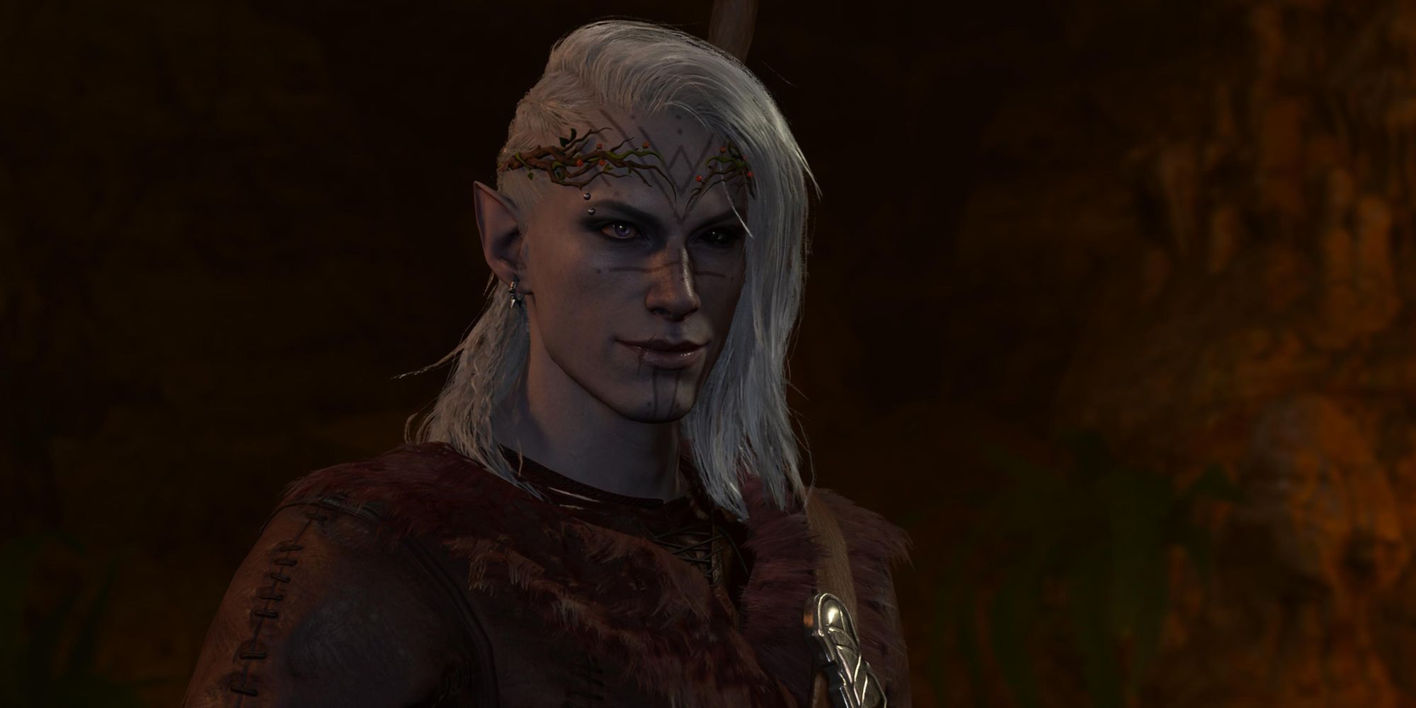 A Half-Elf Drow Dark Urge smiling ominously in Baldur's Gate 3