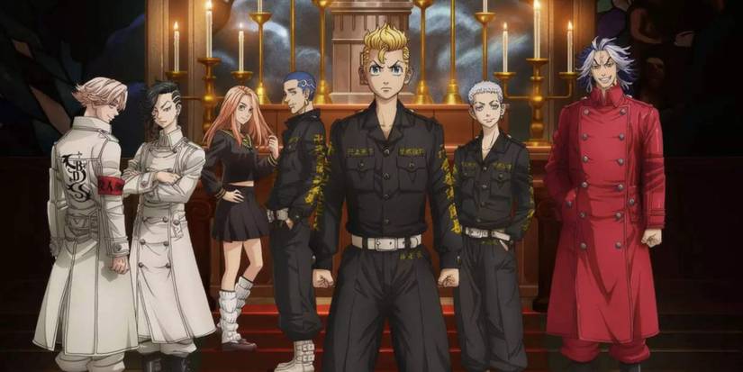 seven people stand in front of an alter