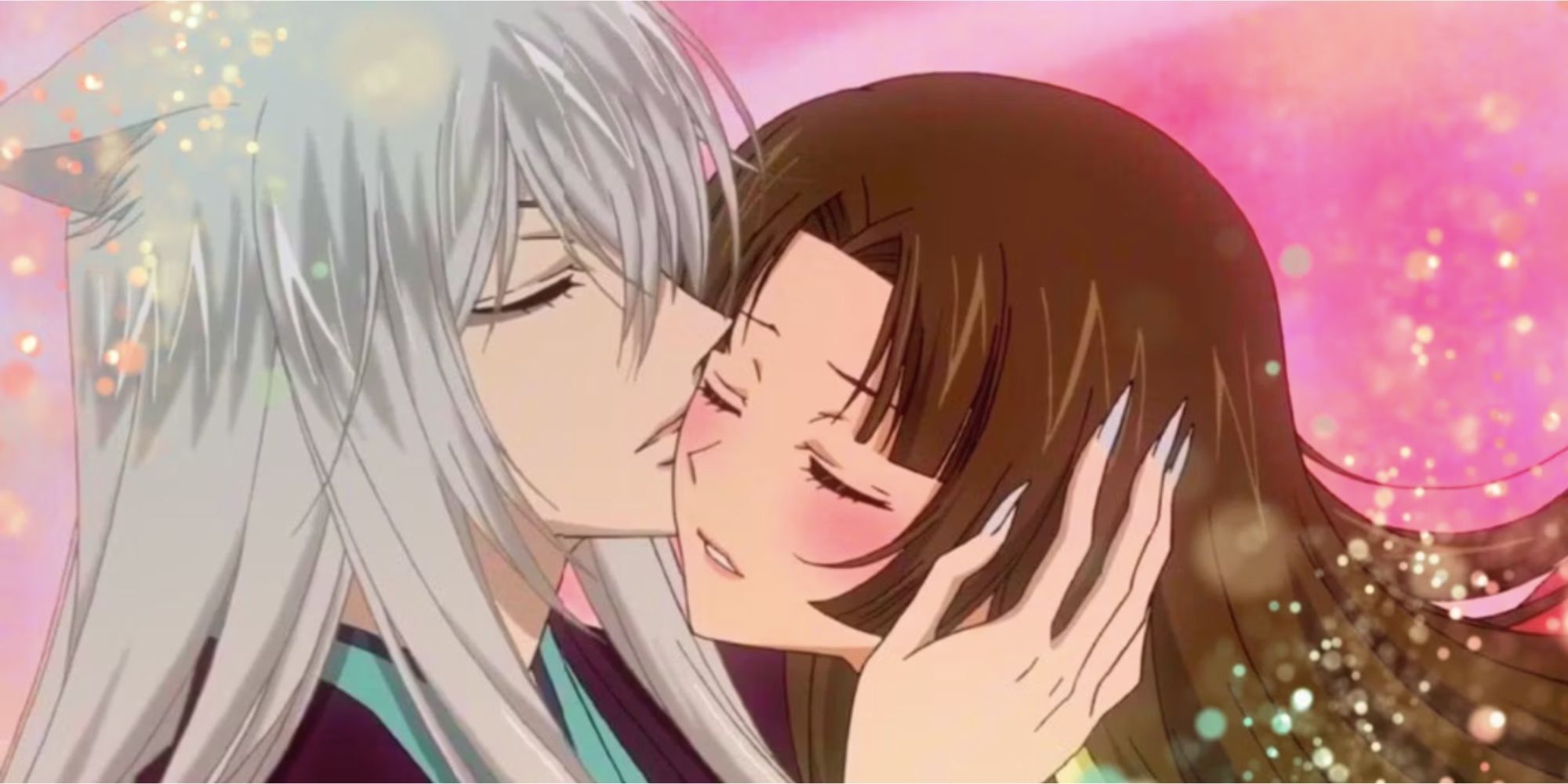 a white haired man with fox ears kisses a brunette girl