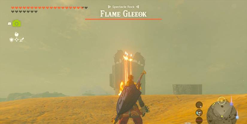 Tears of the Kingdom's Link braces to fight a Flame Gleeok in the Gerudo Desert