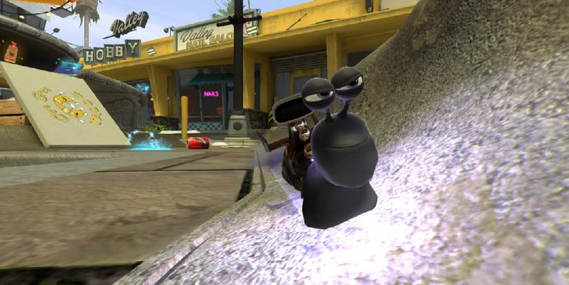 A dark snail on a half-pipe in an urban setting. Image source: igdb.com