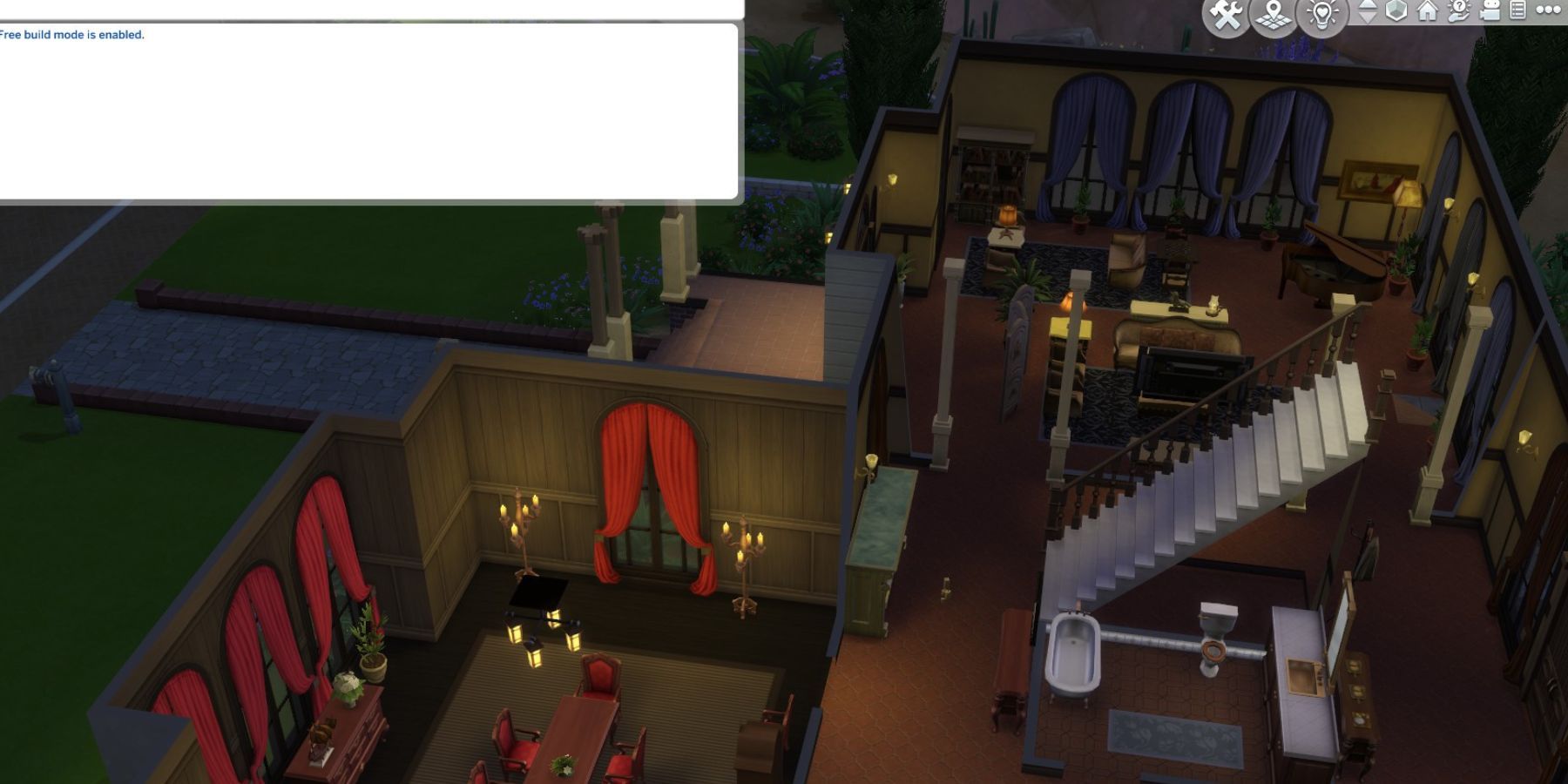 how do you enable free build in sims 4