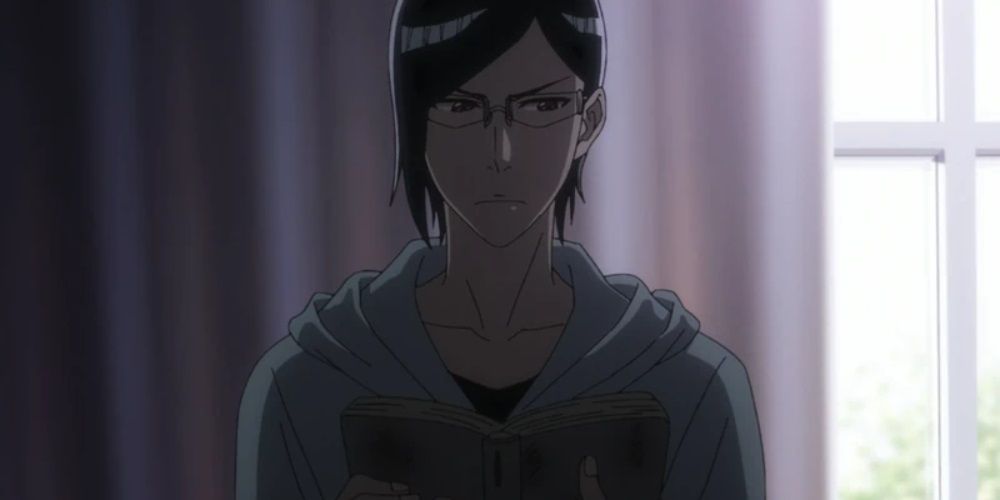 Uryu reading his grandfather's journal in his father's office in the Bleach Thousand-Year Blood War anime