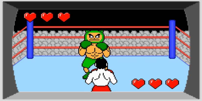 Two men in a boxing ring with hearts