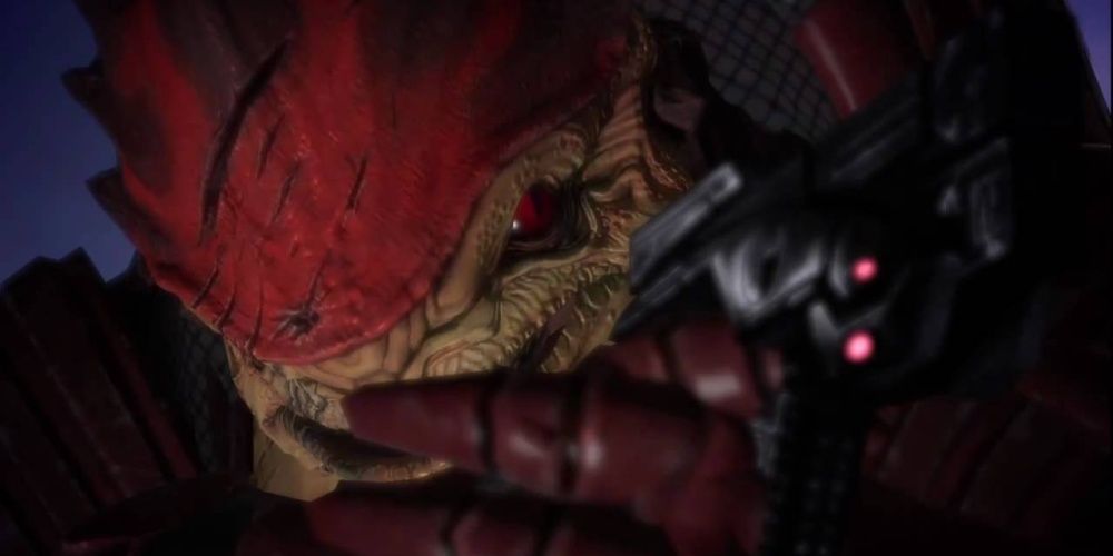 Wrex aiming his pistol at Shepard.