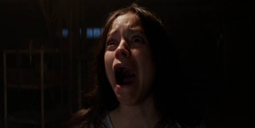 Lauren screaming in horror