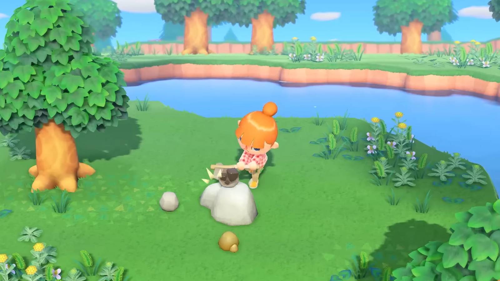 a villager hits a rock with an axe