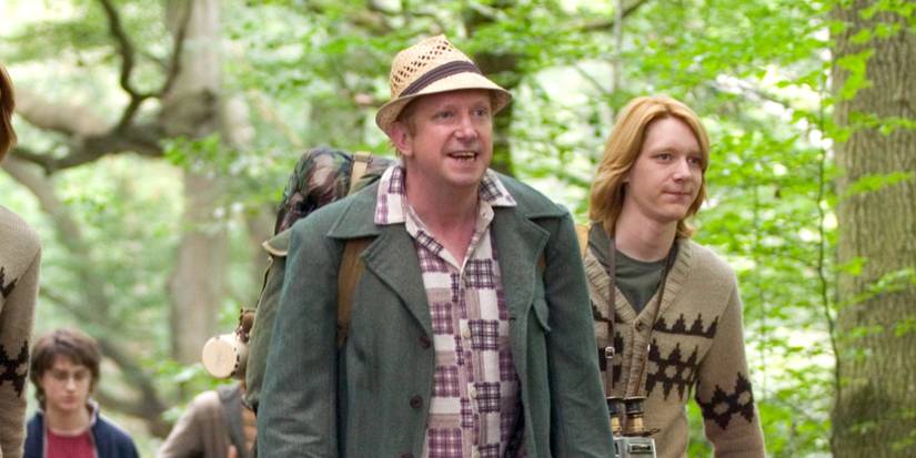 Arthur Weasley leads a group of wizards