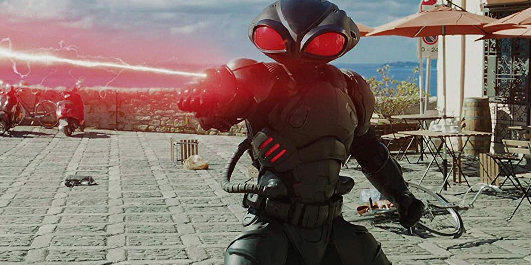 Black Manta shooting a red laser from his wrist