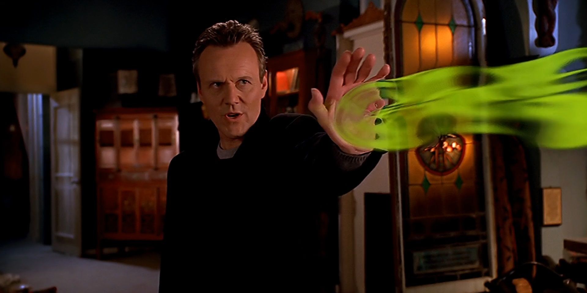 Giles casting a spell in Buffy the Vampire Slayer.