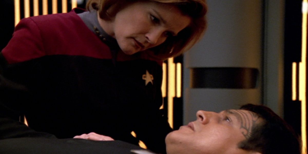 Kate Mulgrew as Captain Janeway. Robert Beltran as Chakotay.