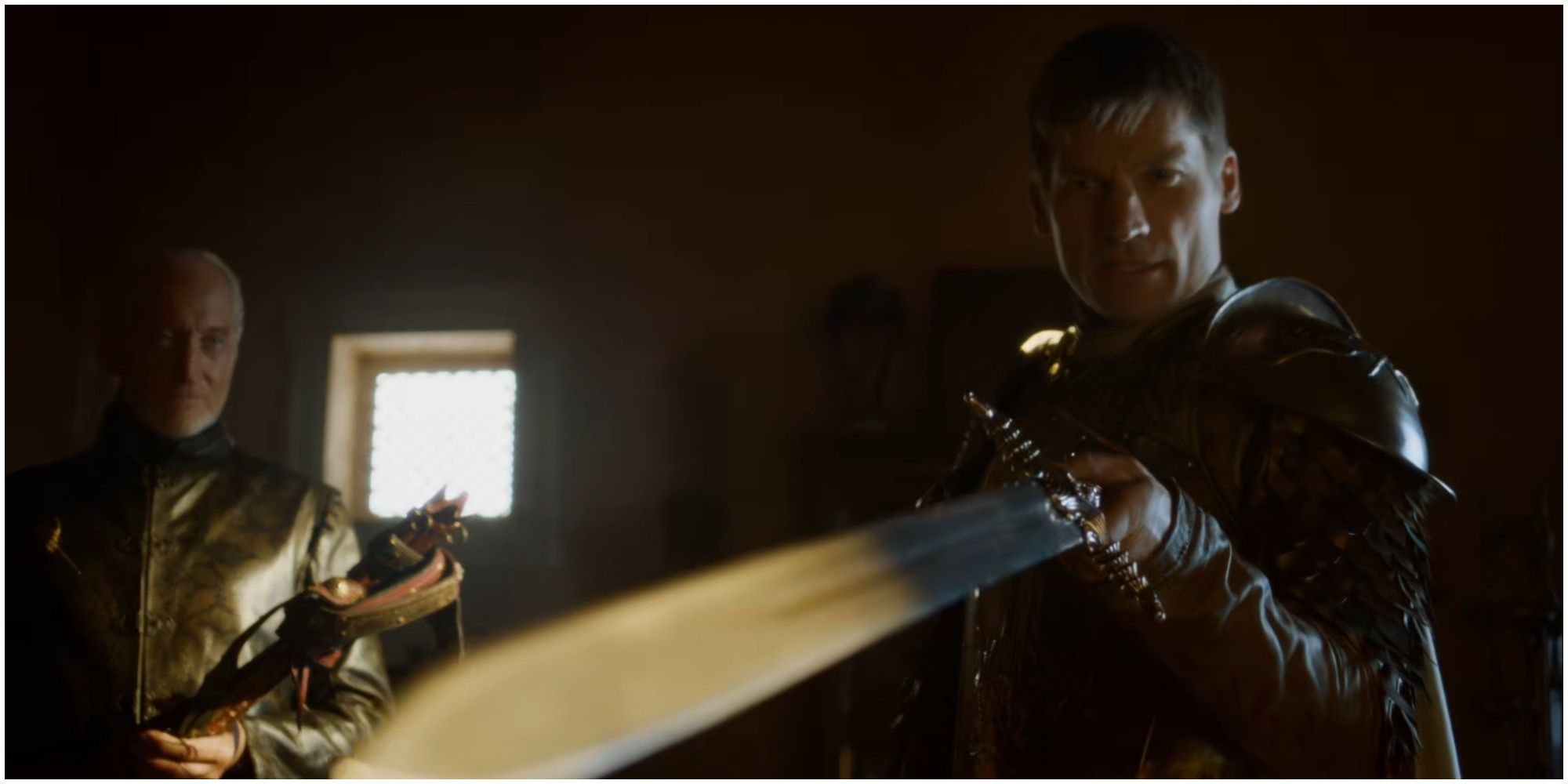 Tywin presents Oathkeeper (unnamed in the scene) to Jaime Lannister in Game of Thrones.