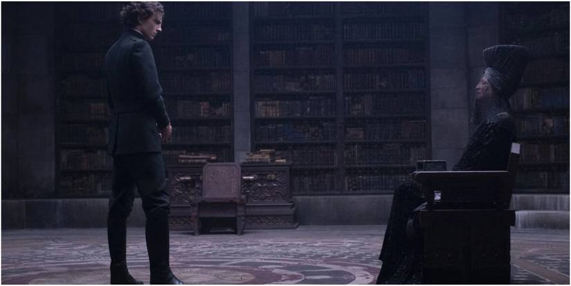 Paul Atreides stands before the Reverend Mother Gaius Helen Mohiam in Dune.