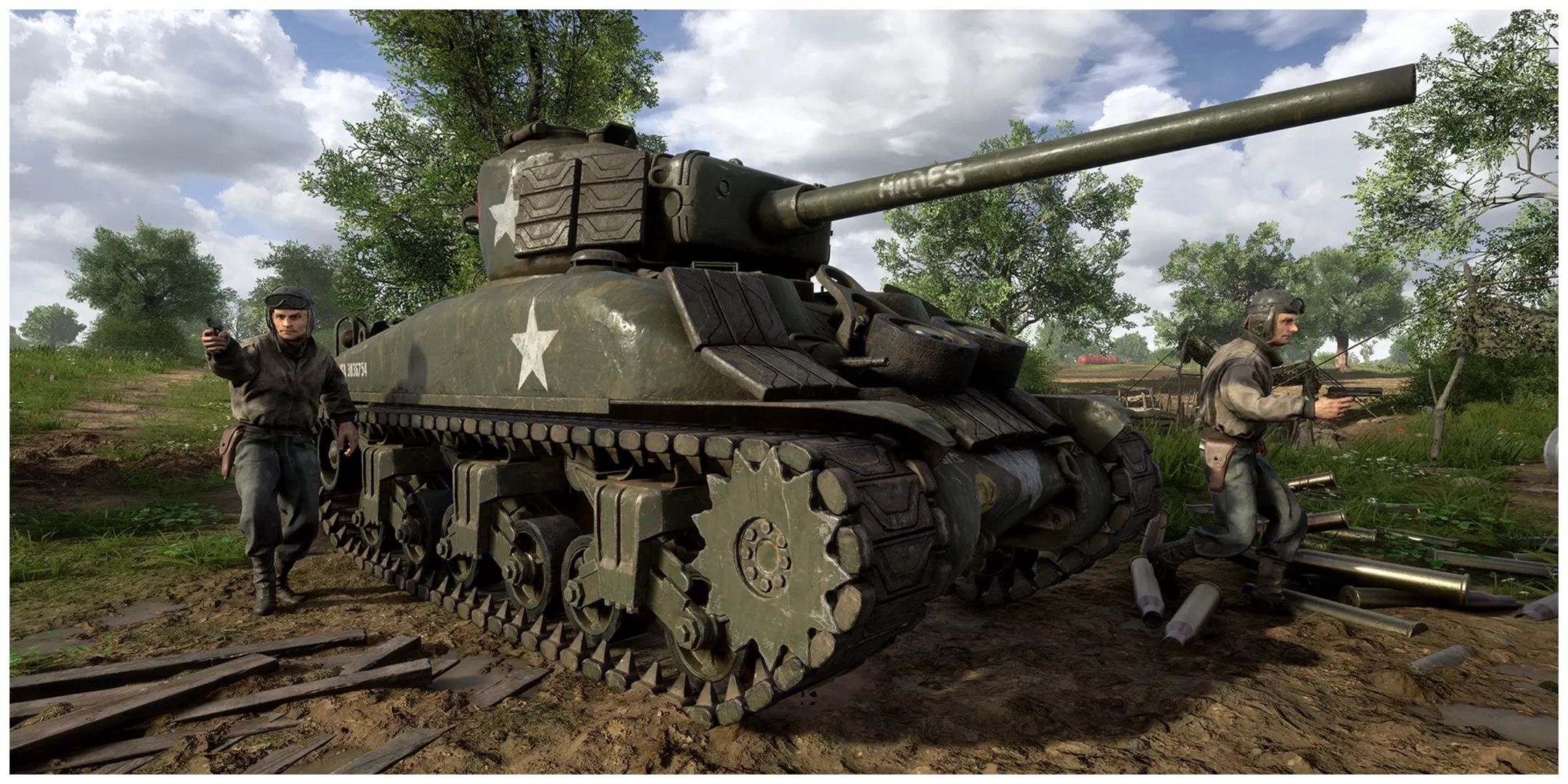 A tank surrounded by two soldiers in a clearing in the forest