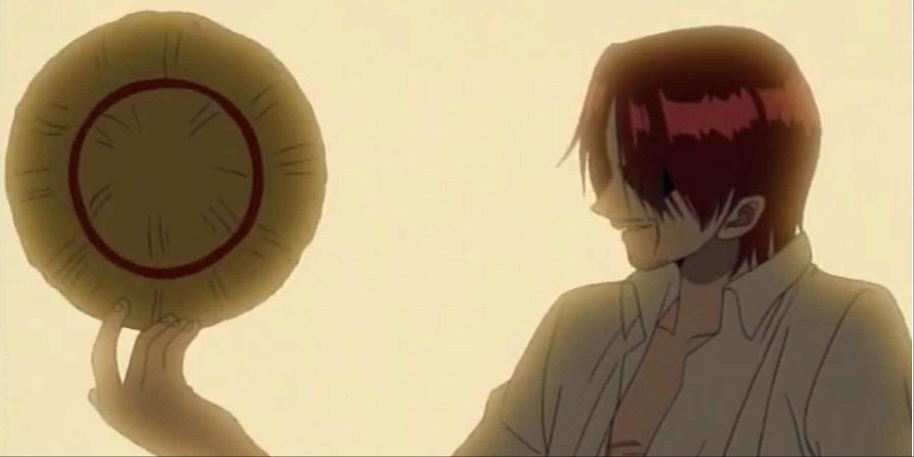 Shanks Looking At His Straw Hat In One Piece