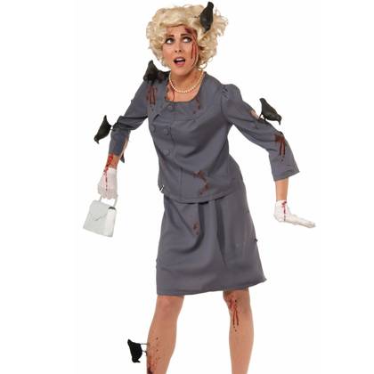 The model is wearing a grey and bloody dress suit with five birds perched on her body.