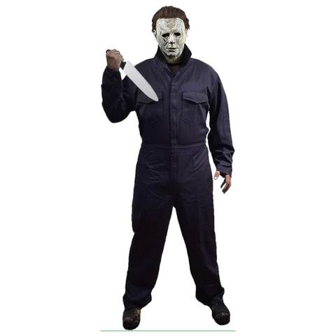 The model is wearing a navy work jumpsuit with black boots and a white human-like mask with brown slicked back hair. 