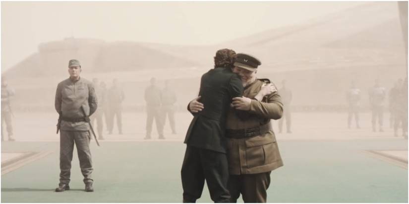 Paul Atreides hugs Thufir Hawat in Dune.