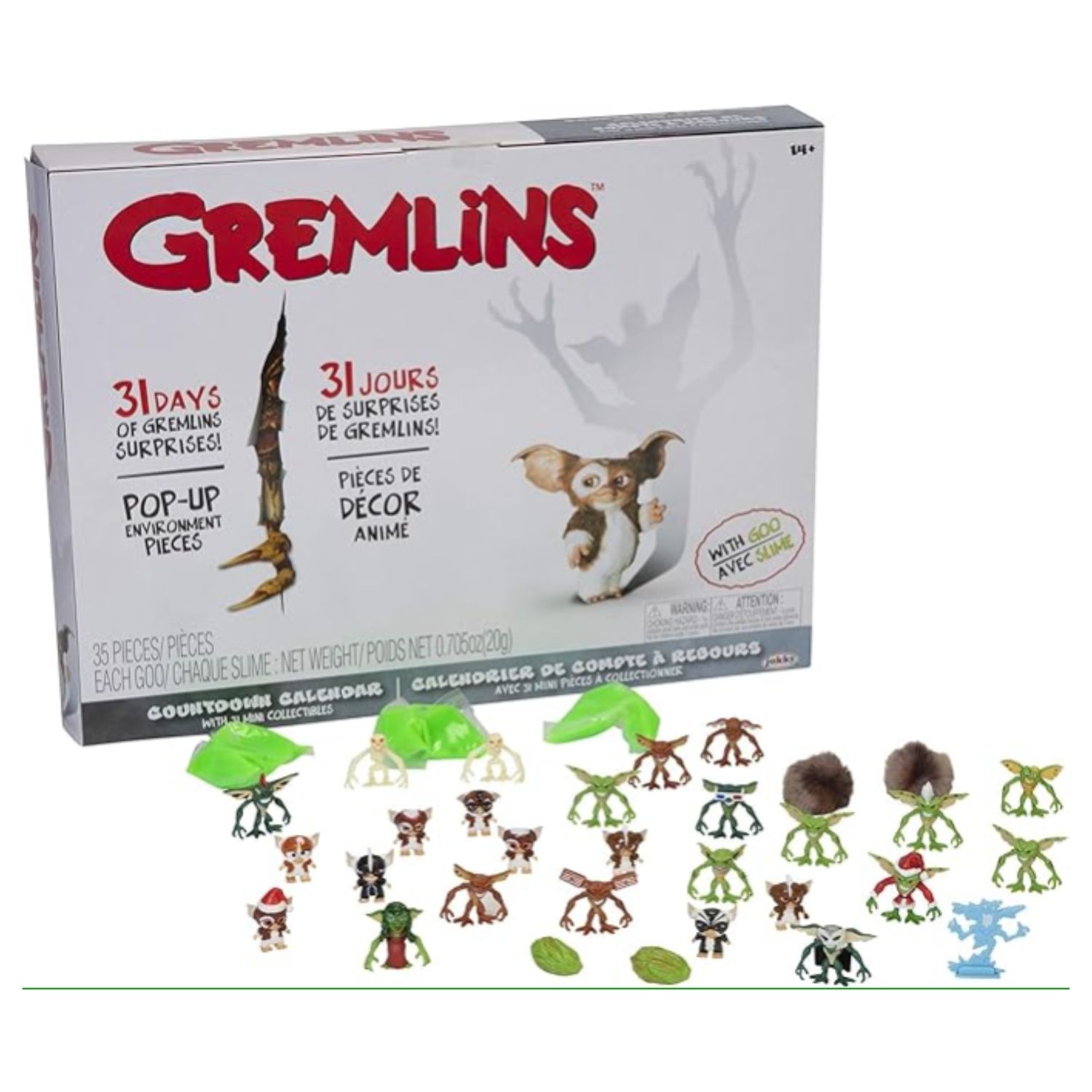 This image depicts the packaging and some of the contents of the Gremlins Advent Calendar