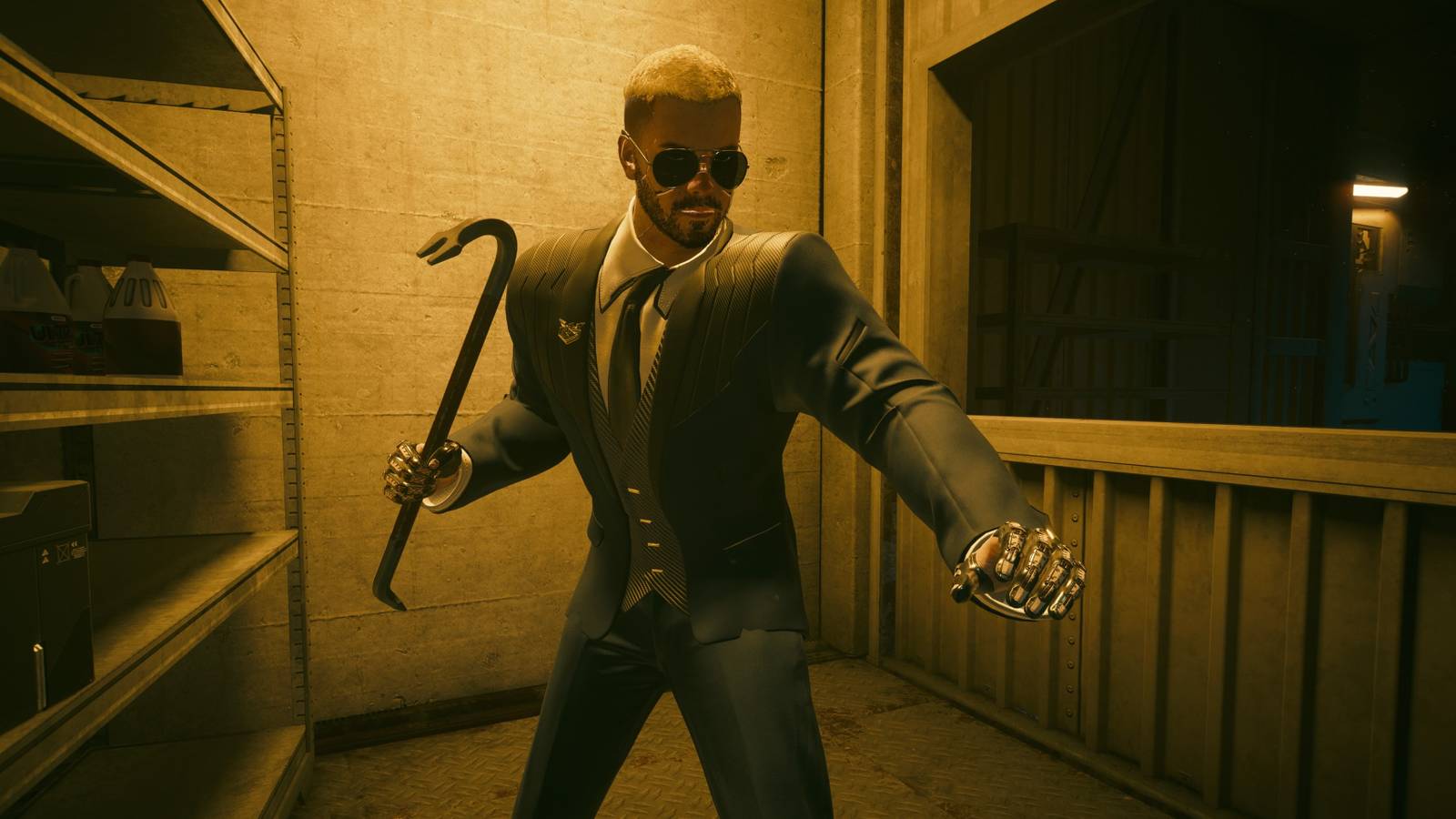 V wearing an FIA suit whilst holding a crowbar weapon