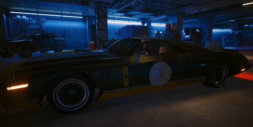 johnny silverhand and v sitting in the "charon" quadra car
