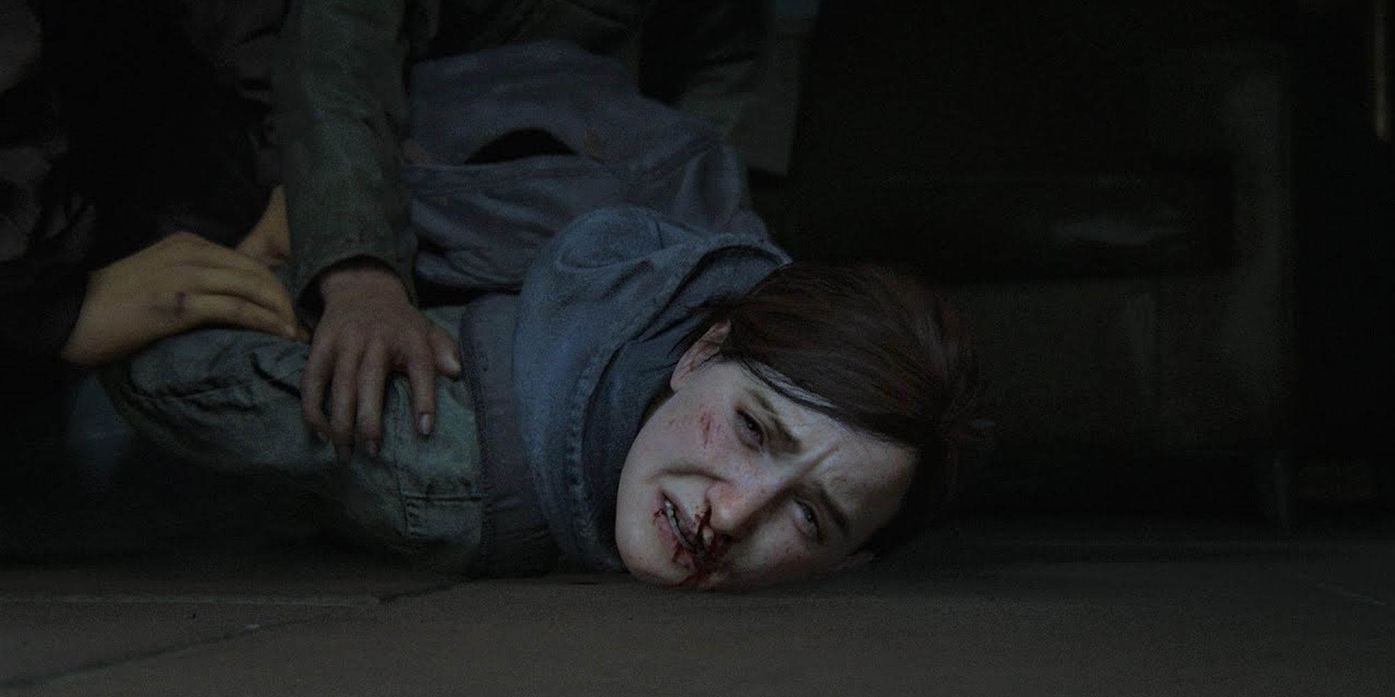 Ellie looking devastated in The Last of Us Part II