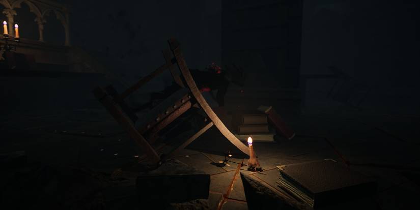 The little candle standing amidst debris of the cathedral in Flicker of Hope