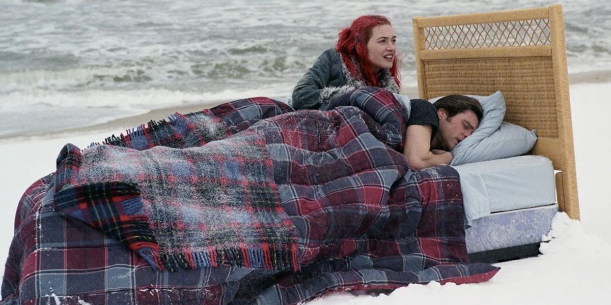 Kate Winslet and Jim Carrey wake up in a bed on a snowy beach