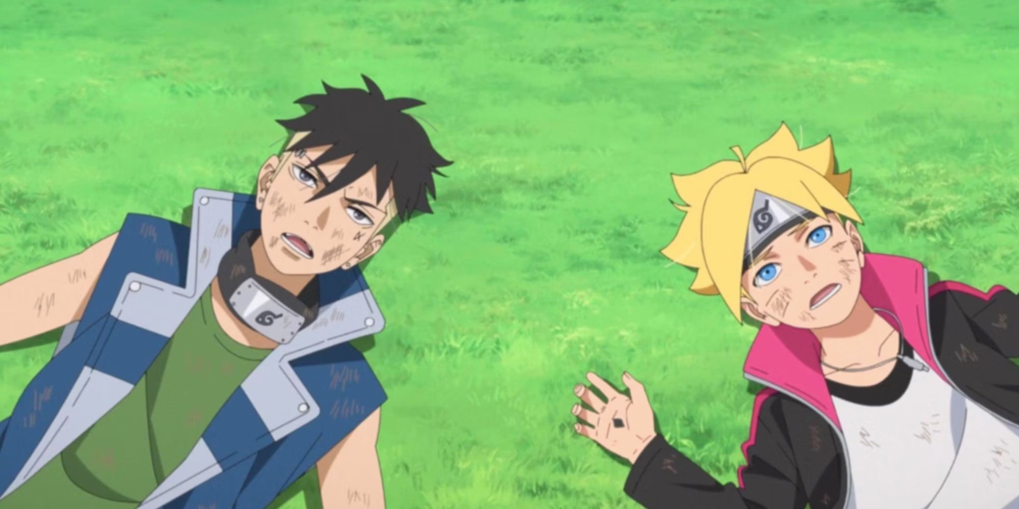 kawaki and boruto lay on the grass