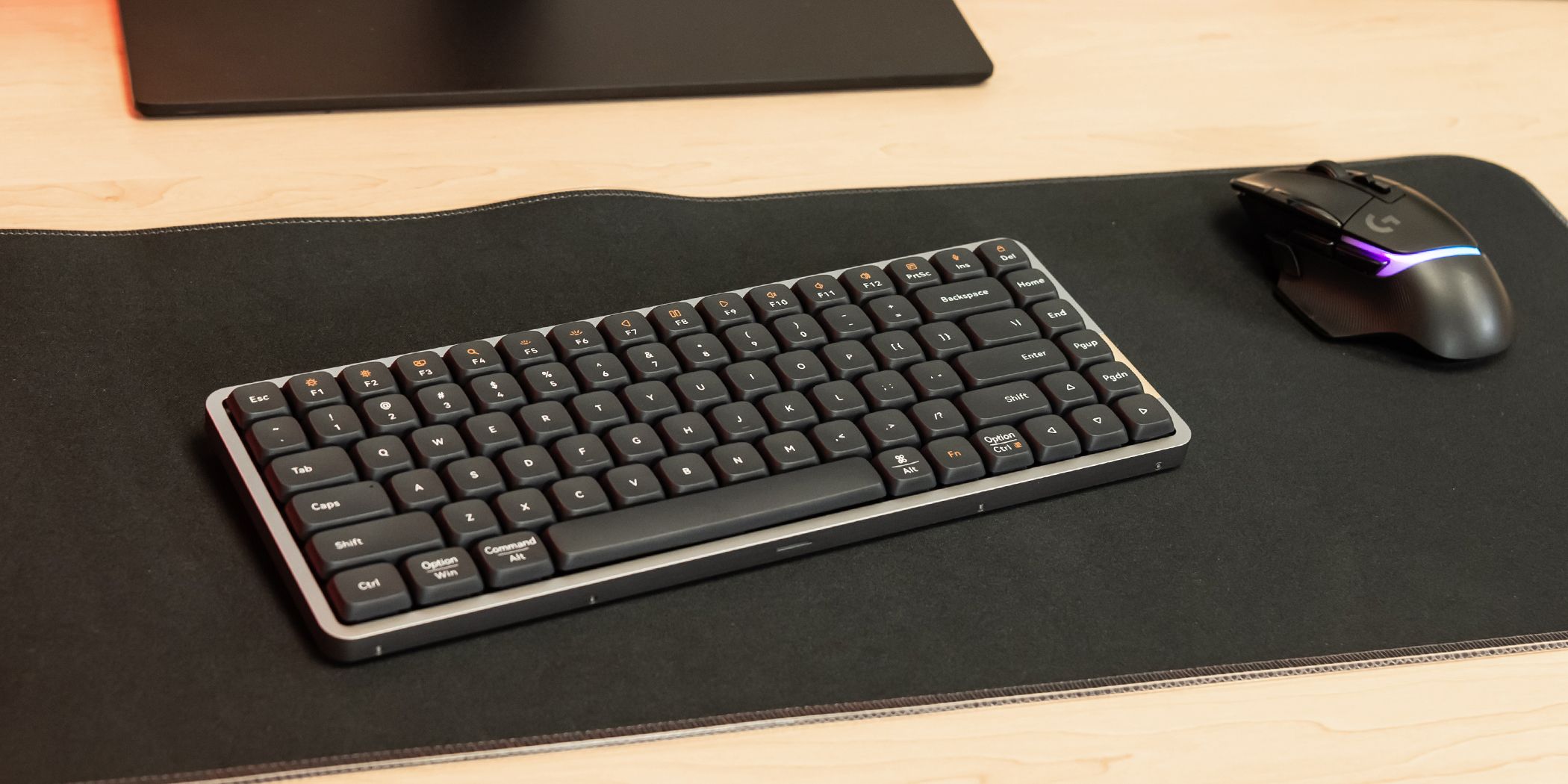 Lofree Flow keyboard next to a mouse