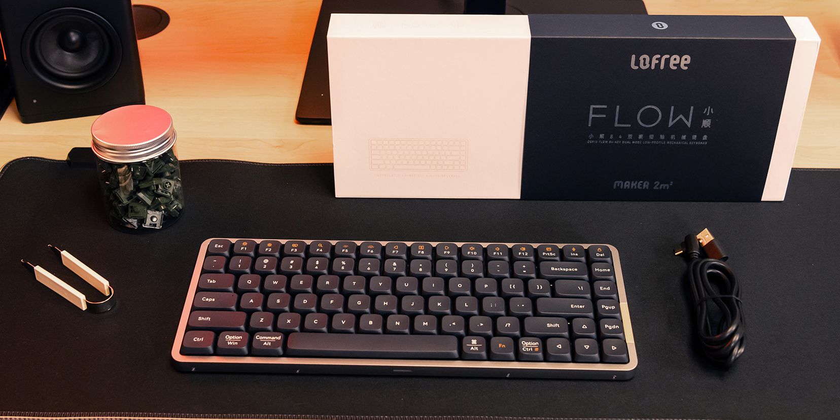 Lofree Flow keyboard with the box and swappable switches