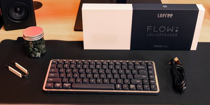 Lofree Flow keyboard with the box and swappable switches