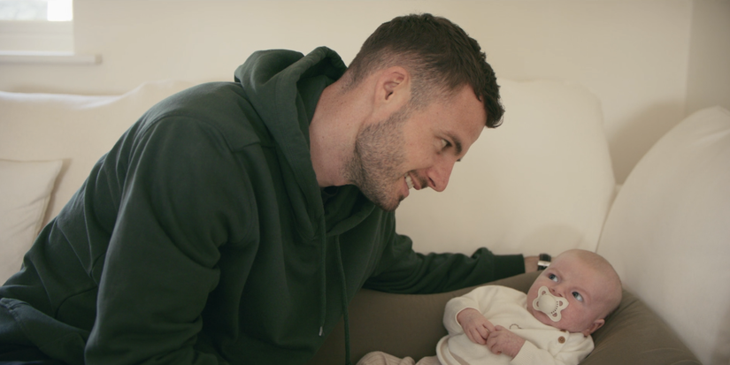Wrexham captain Luke Young with baby boy