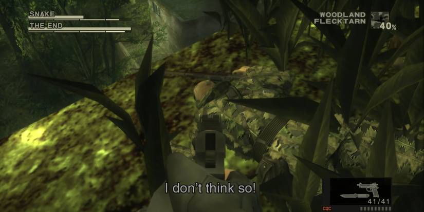 Naked Snake holding The End Up at gunpoint in a grassy knoll in Metal Gear Solid 3